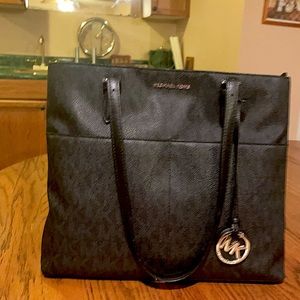 Large Michael Kors black MK bag.